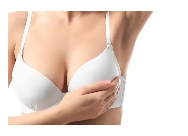 Young woman with beautiful breast on white background
